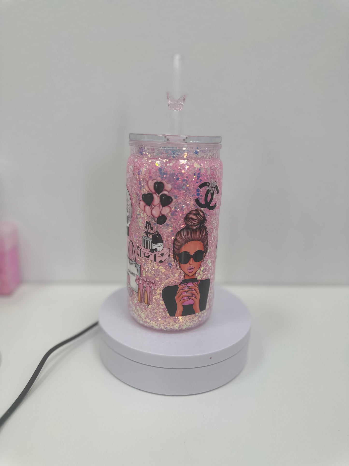 Channel inspired acrylic snowglobe